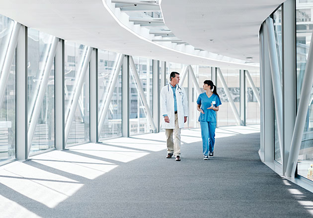Doctor and nurse in a large hospital facility
